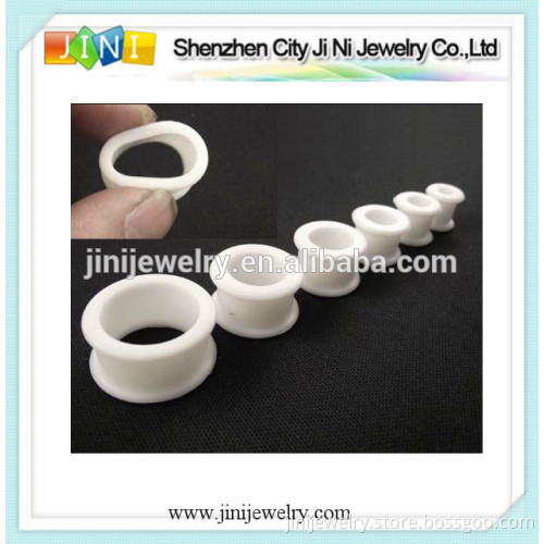 white silicone ear tunnel plug